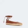 Ballerinas aus Nappa und Raffia, tabakfarben Ballerinas aus Nappa und Raffia, tabakfarben