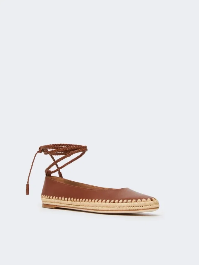 Ballerinas aus Nappa und Raffia, tabakfarben Ballerinas aus Nappa und Raffia, tabakfarben