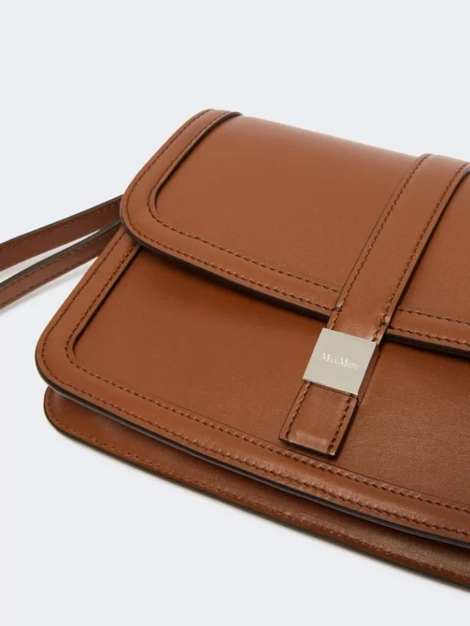Clutch aus Glattleder, tabakfarben Clutch aus Glattleder, tabakfarben