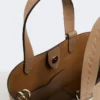 Extra kleine Archetipo-Tasche aus Leder, schlammfarben